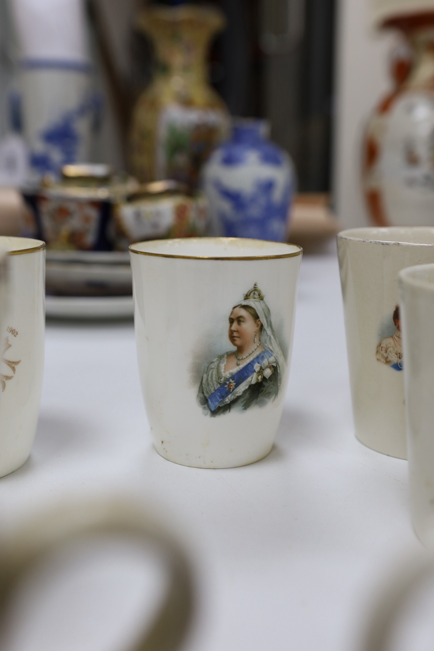 A collection of 19th/20th century commemorative ceramics including a Paragon QEII coronation commemorative Loving cup
